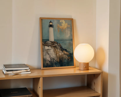 Lighthouse Painting Gold Leaf Clouds Coastal Canvas Wall Art — Harbor sentinel artwork mounted in minimalist dining space for modern coastal home styling