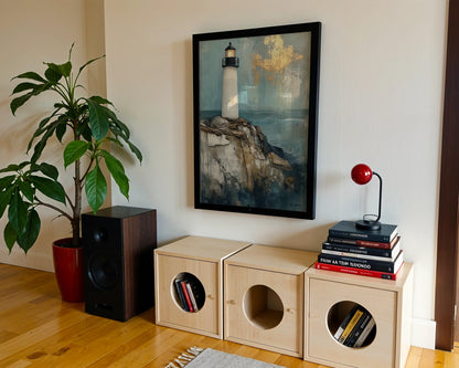 Lighthouse Painting Gold Leaf Clouds Coastal Canvas Wall Art — Thick paint sea tower canvas displayed in boho living area for eclectic beach house decor