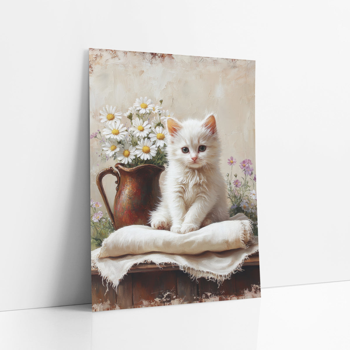 Wildflower Kitten Linen Cream Vintage art print leaning against a white wall – fluffy white kitten sitting on a linen cloth