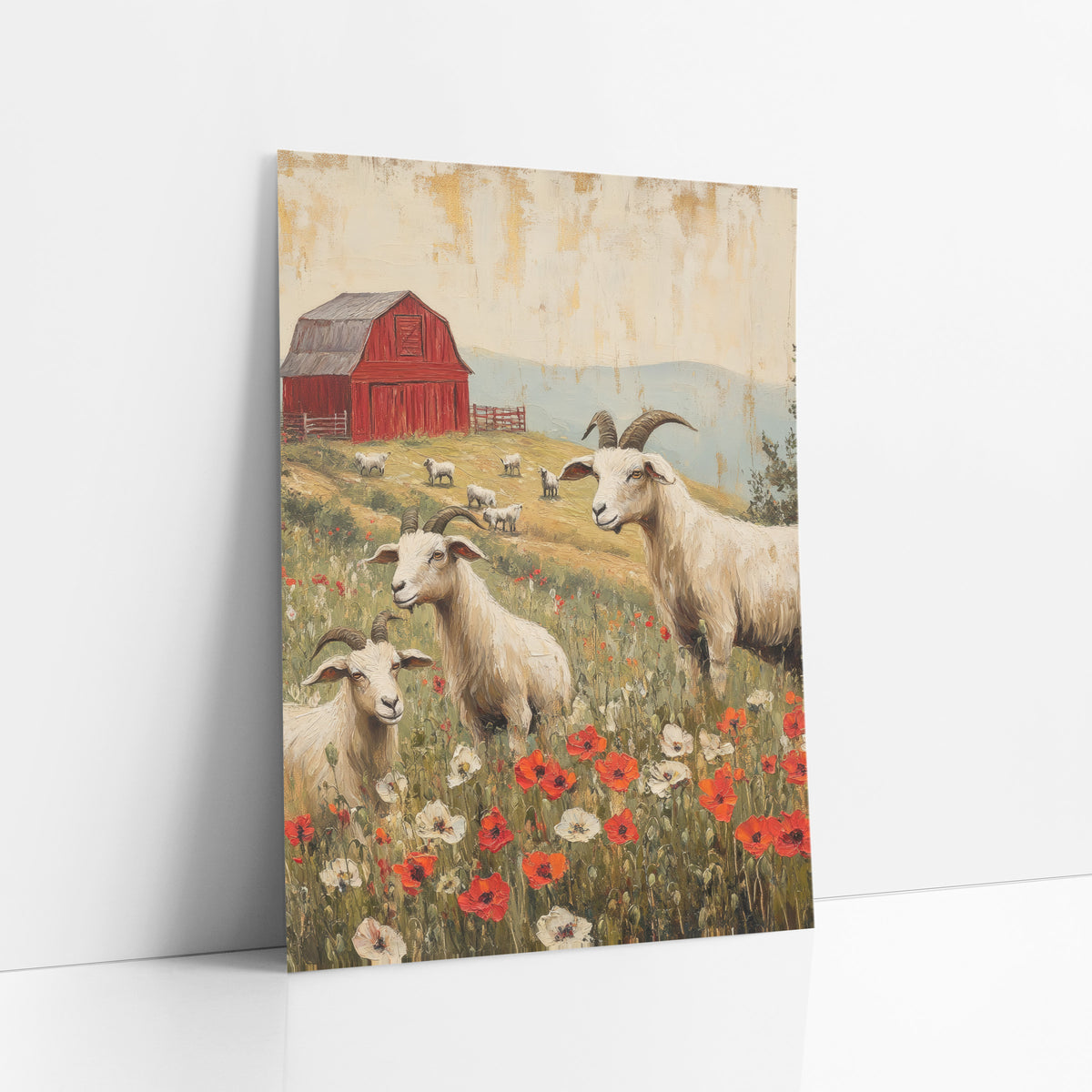 Goats and Poppy Meadow Farmhouse art print leaning against a white wall – three cream goats among red poppies and white