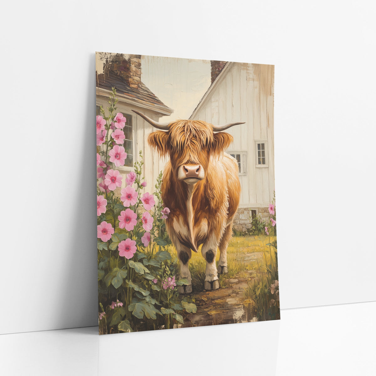 Golden Highland Cow Meadow Path Farmhouse art print leaning against a white wall – ginger Highland cow with long horns