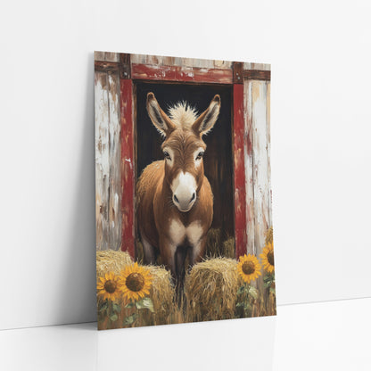 Barn Door Donkey Sunflower Farmhouse art print leaning against a white wall – brown donkey looking out of a red-framed barn