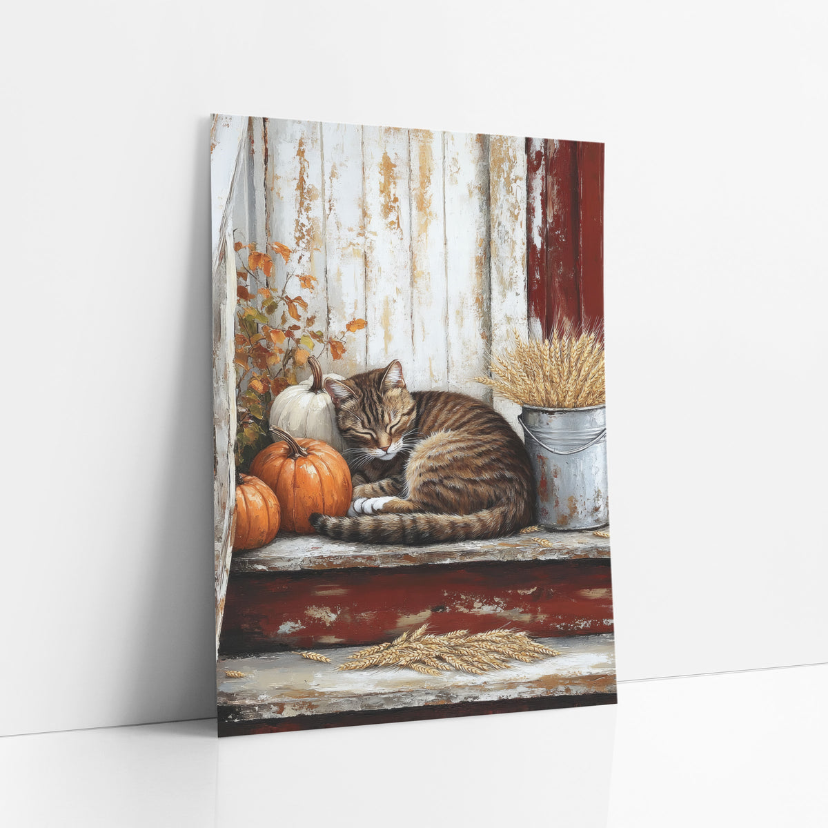 Tabby Cat Autumn Porch Farmhouse art print leaning against a white wall – tabby cat asleep on worn porch steps beside orange