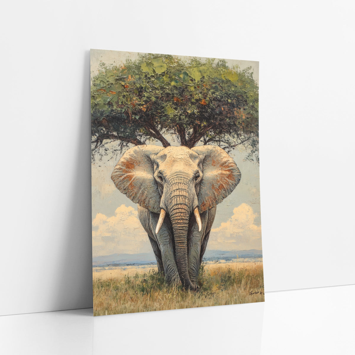 Savanna Elephant Beneath Tree Boho art print leaning against a white wall – front-facing elephant with wide ears and pale