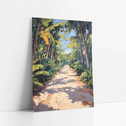 Sunlit Tropical Path Boho art print leaning against a white wall – sandy path with dappled shadows between tall banana trees