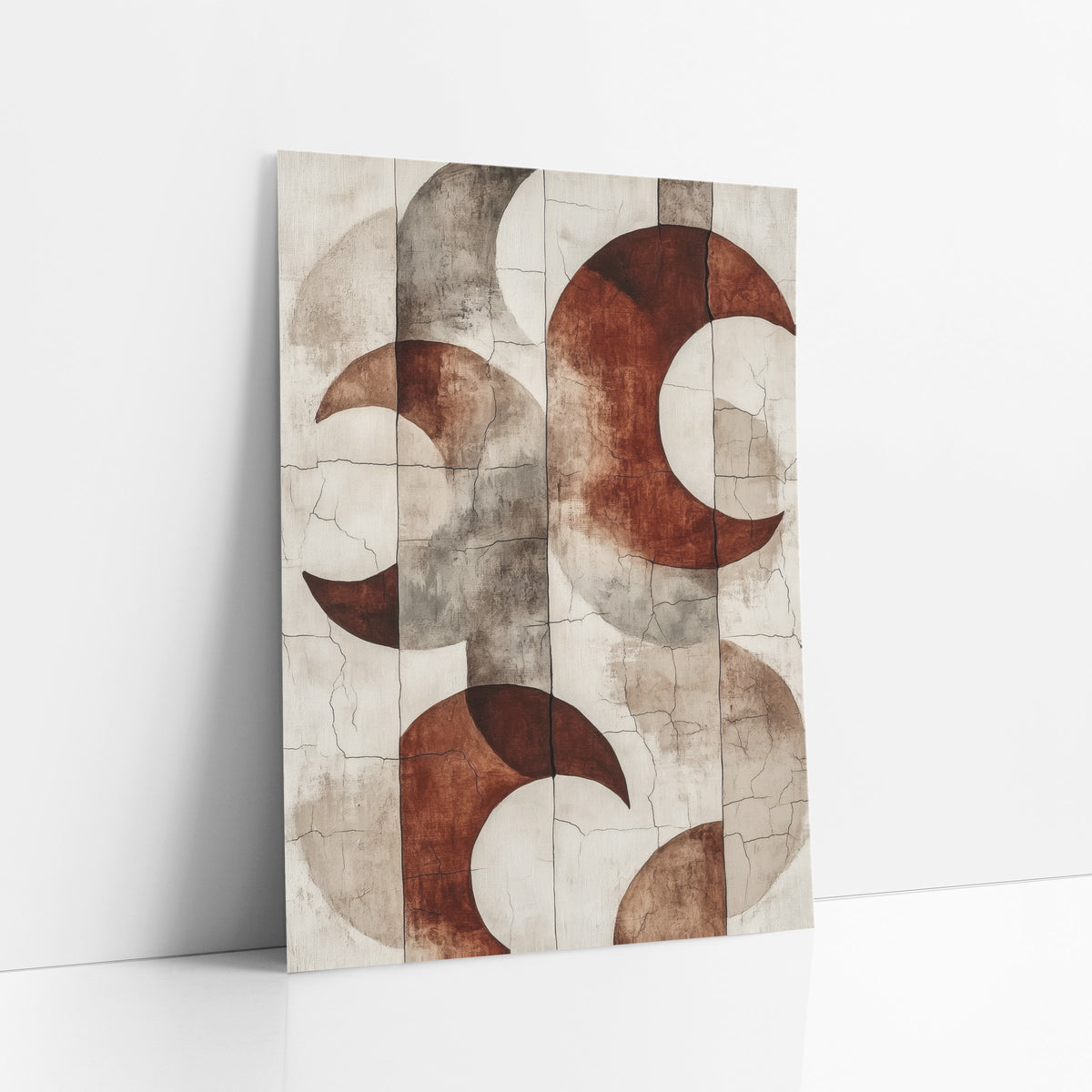 Rust Crescent Abstract Boho art print leaning against a white wall – abstract art of rust red crescent moons and gray