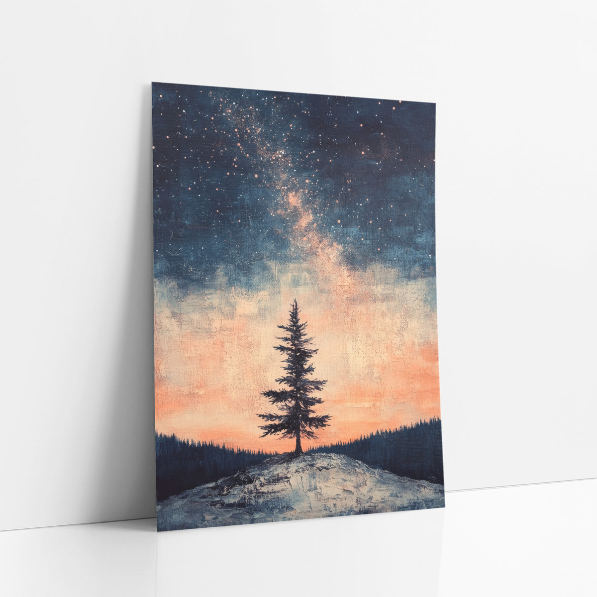 Lone Evergreen Starry Sky Boho art print leaning against a white wall – lone evergreen tree on a pale hilltop under a starry