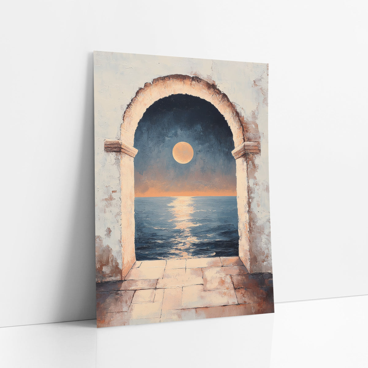 Moonlit Sea Through Arch Mystical art print leaning against a white wall – full orange moon over a calm navy sea seen through