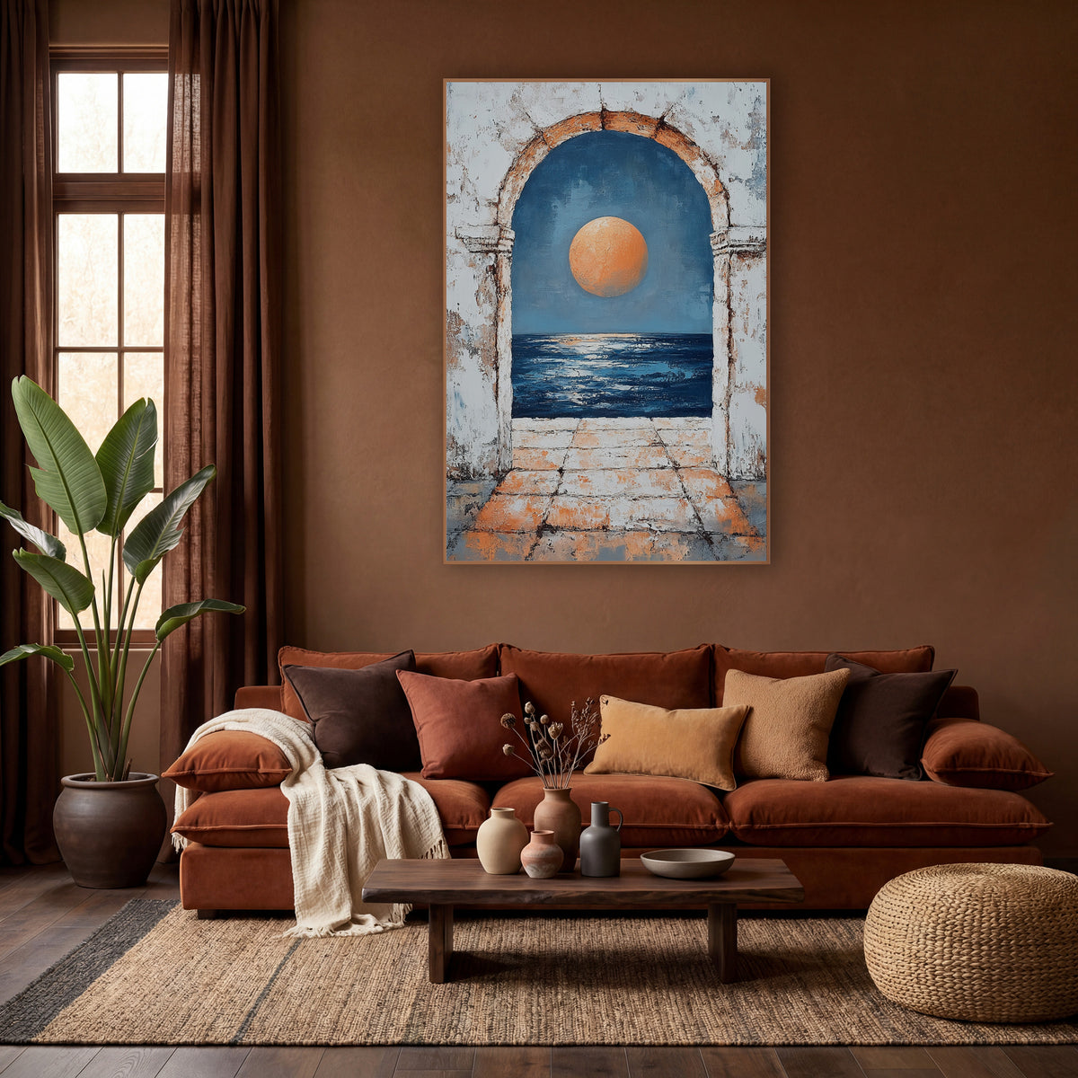 Orange Moon Arch Coastal Boho wall art in a warm boho-style room – large orange moon over dark blue sea seen through