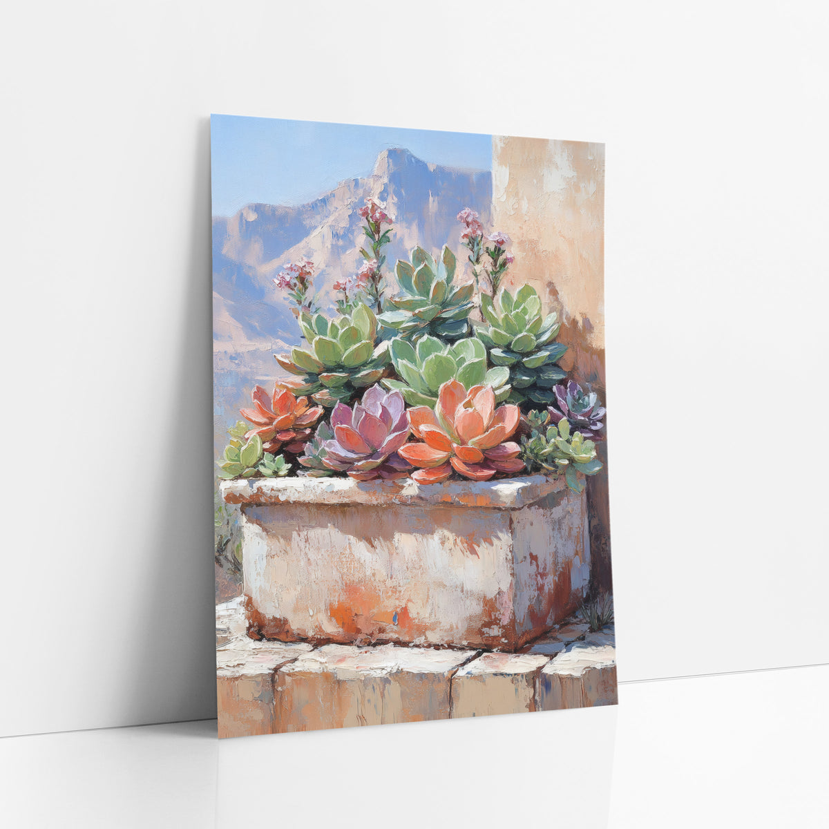 Succulent Trough Desert Boho art print leaning against a white wall – succulents in green, coral and mauve in a weathered