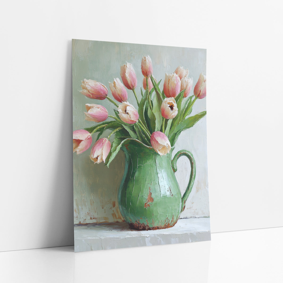 Blush Tulips Green Pitcher Still Life art print leaning against a white wall – pink and cream tulips leaning out of a chipped