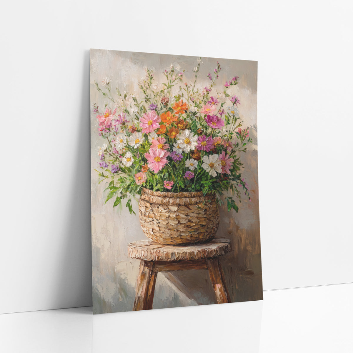 Wildflower Basket Stool Boho art print leaning against a white wall – pink, white and orange wildflowers in a woven basket