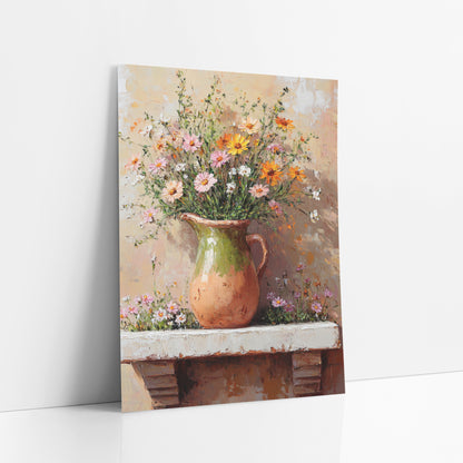 Peach Wildflower Jug Boho art print leaning against a white wall – pink, orange and white wildflowers in a green-glazed clay