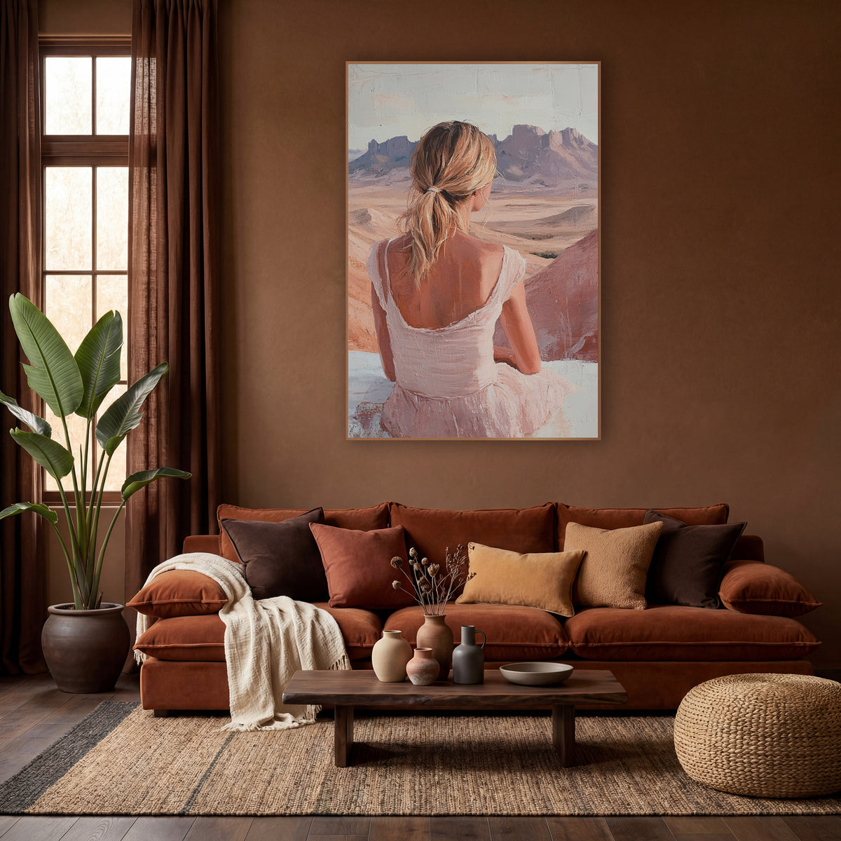Woman Overlooking Desert Mesas Boho wall art in a warm boho-style room – woman in a blush pink dress seen from behind