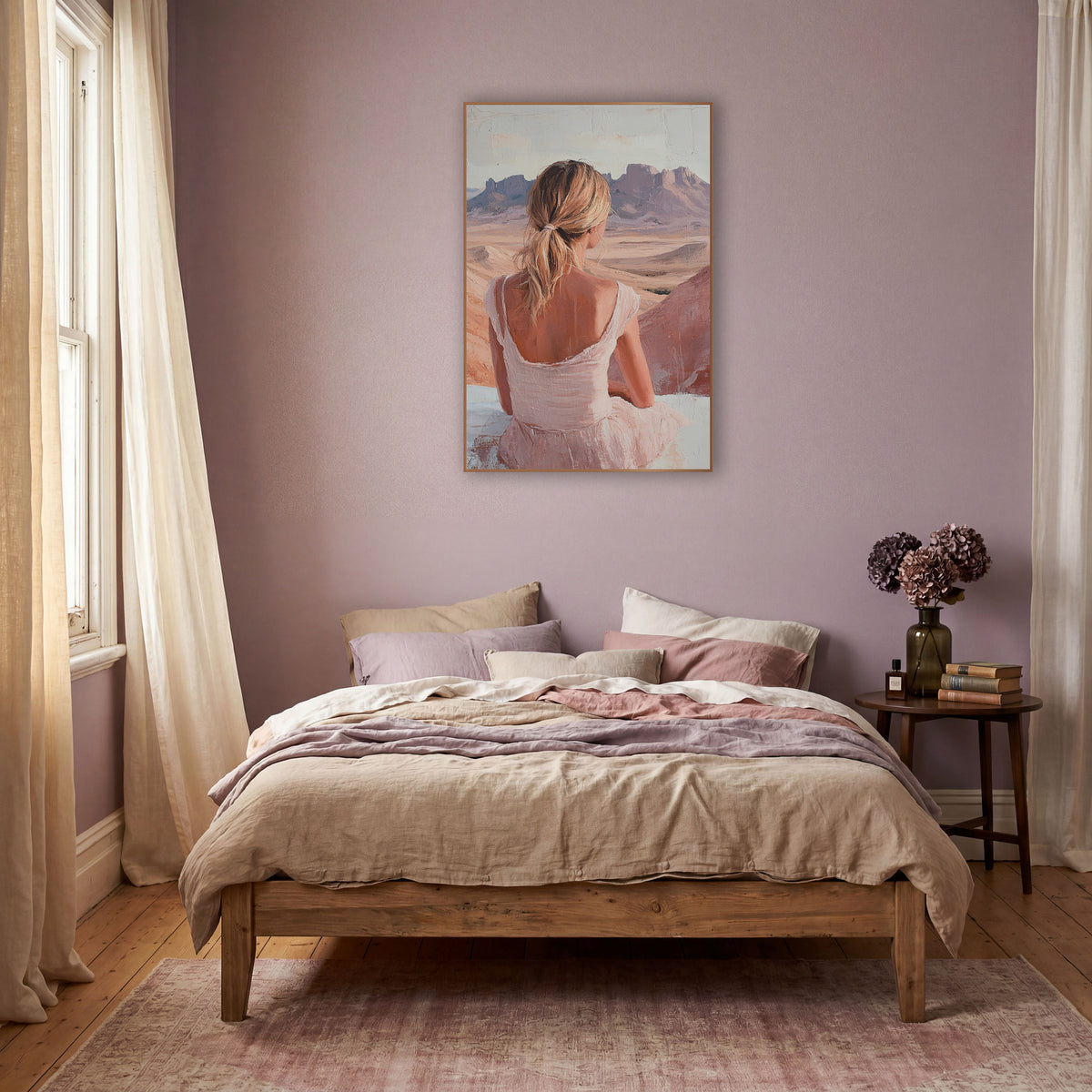 Woman Overlooking Desert Mesas Boho wall art in a warm boho-style room – woman in a blush pink dress seen from behind