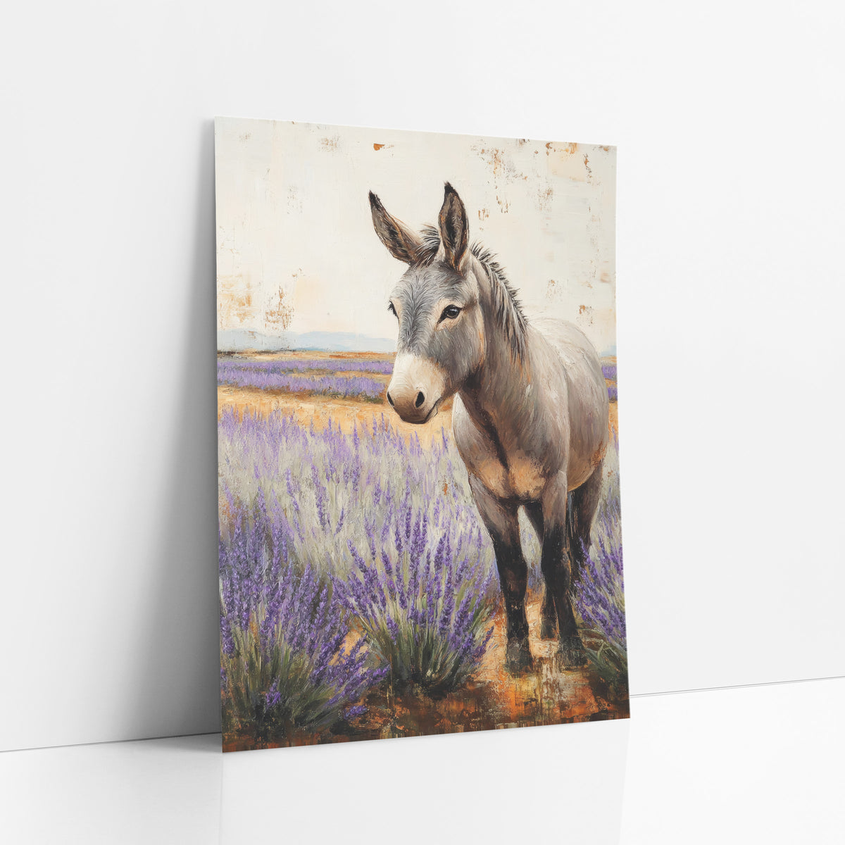 Gray Donkey Lavender Field Farmhouse art print leaning against a white wall – gray donkey standing in a purple lavender field