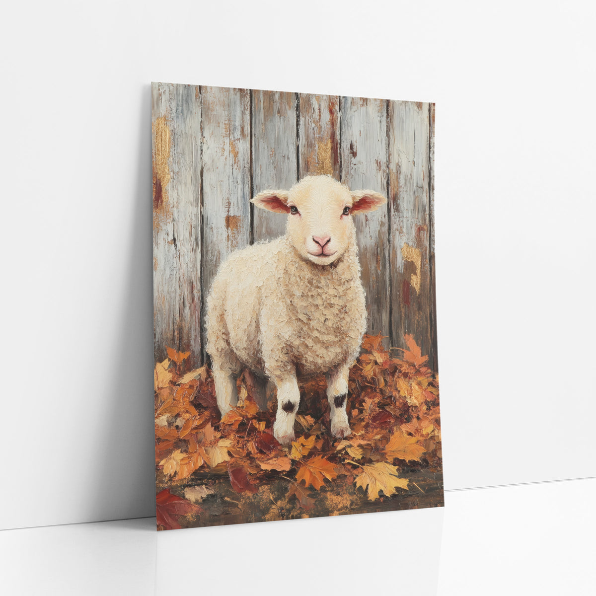 Cream Lamb Autumn Leaves Farmhouse art print leaning against a white wall – cream lamb with pink ears standing in autumn
