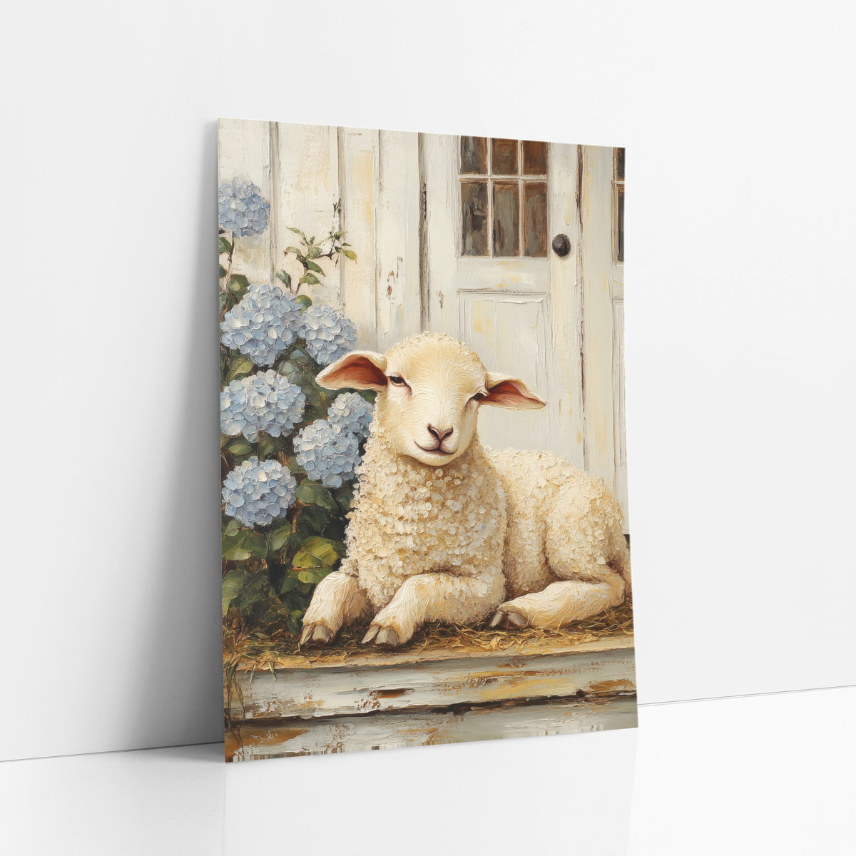 Resting Lamb Hydrangea Farmhouse art print leaning against a white wall – cream lamb resting on a worn porch step beside blue