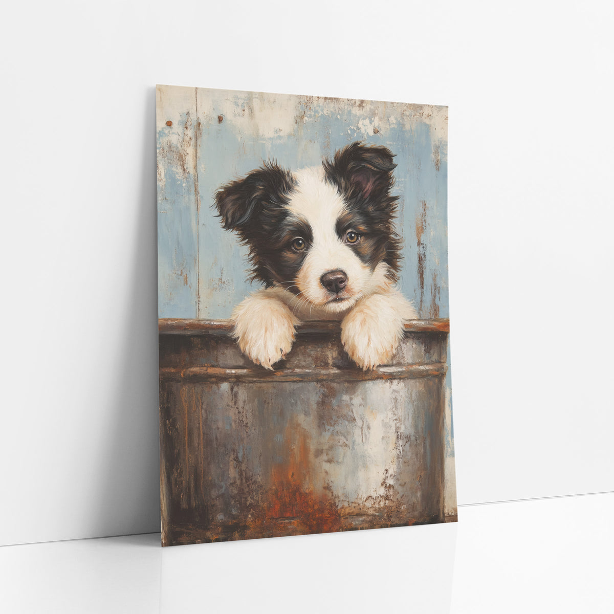 Rust Bucket Puppy Farmhouse Portrait art print leaning against a white wall – black and white puppy with paws on a rusty