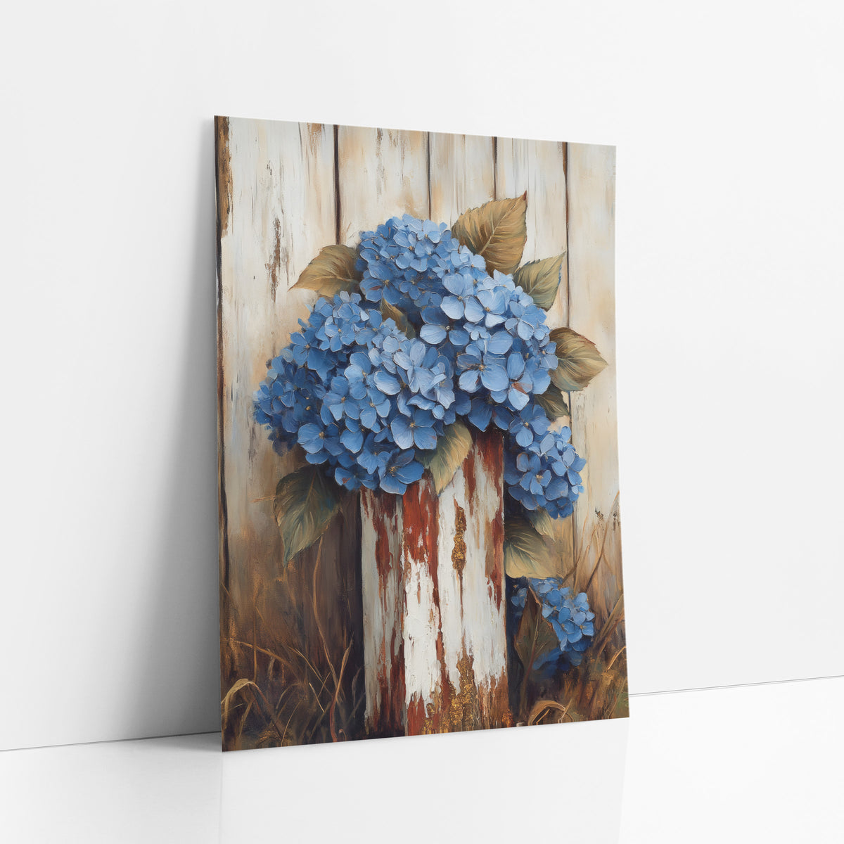 Hydrangea Crowned Rusted Post art print leaning against a white wall – cluster of blue hydrangeas with olive leaves