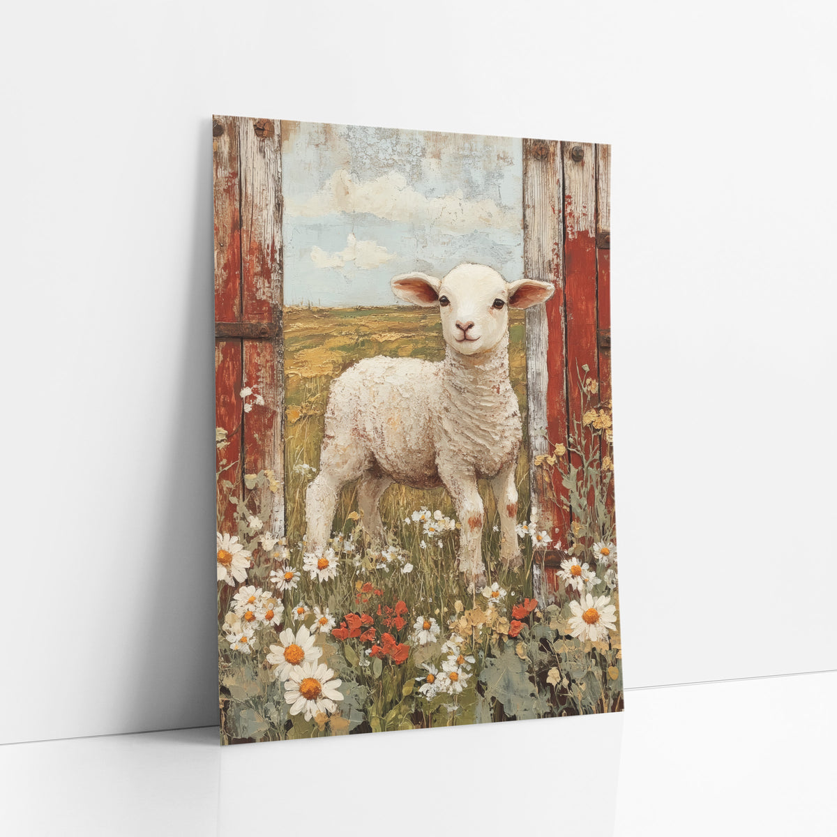 Lamb Red Barn Doors Farmhouse art print leaning against a white wall – white lamb standing in a daisy and wildflower meadow