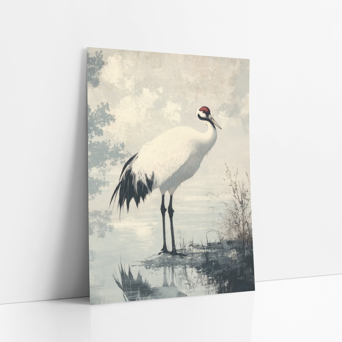 Red Crowned Crane Japandi Pond art print leaning against a white wall – white red-crowned crane with black legs standing