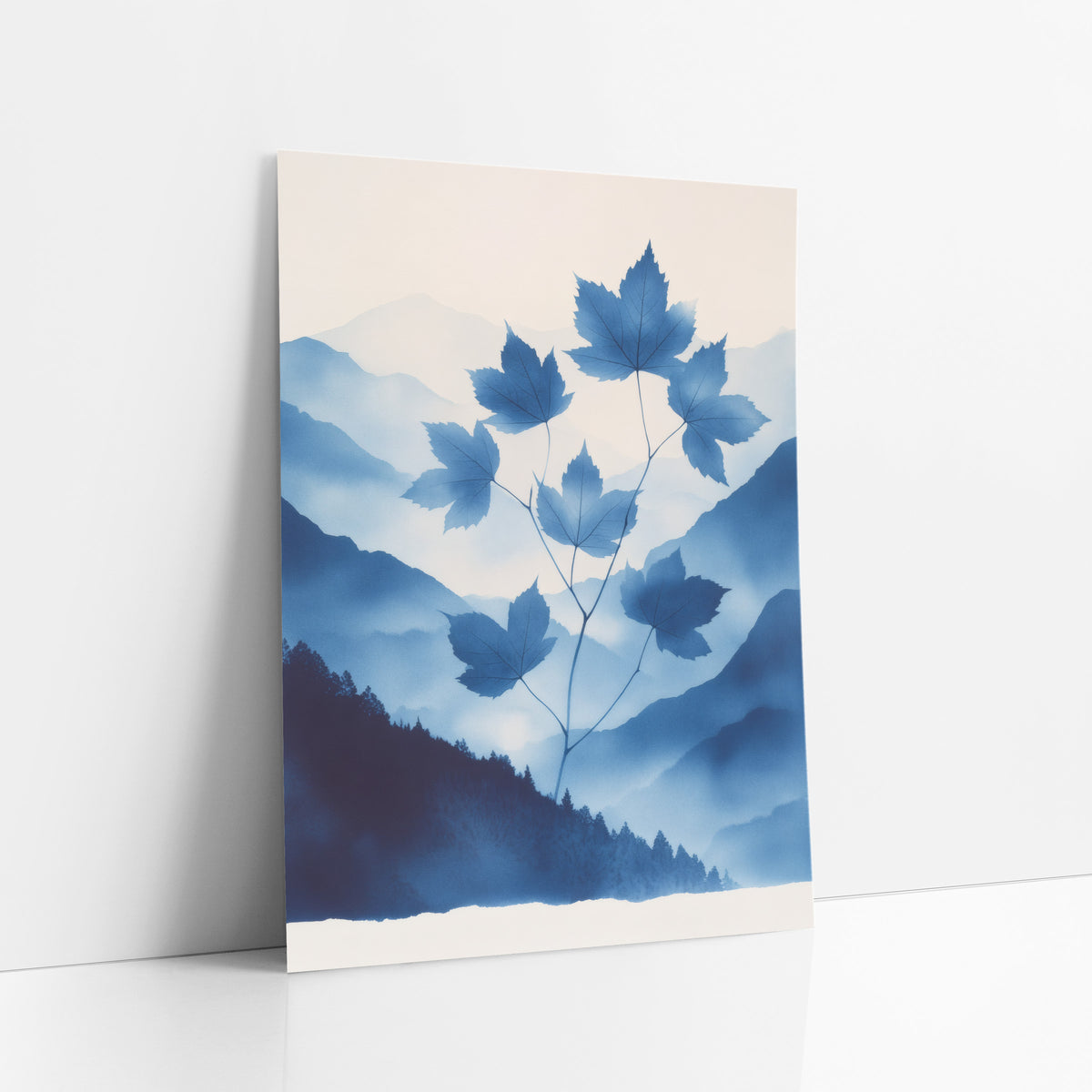 Rising Maple Sprig Cyanotype Mountains art print leaning against a white wall – blue maple leaves on thin stems in front