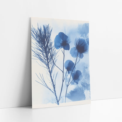Indigo Seedhead Silhouette Botanical art print leaning against a white wall – dark blue feathery sprig and four translucent