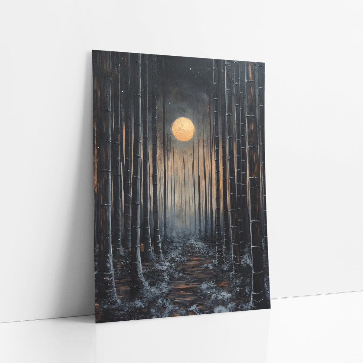 Moonlit Bamboo Path Japandi art print leaning against a white wall – dark bamboo grove at night with a glowing gold moon