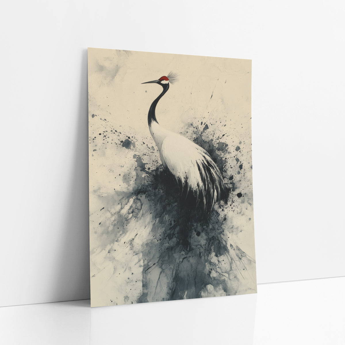 Red-Crowned Crane Ink Splash Japandi art print leaning against a white wall – crane with red crown and white feathers