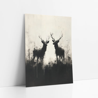 Twin Stag Silhouettes Ink Style art print leaning against a white wall – two black antlered deer in silhouette facing each