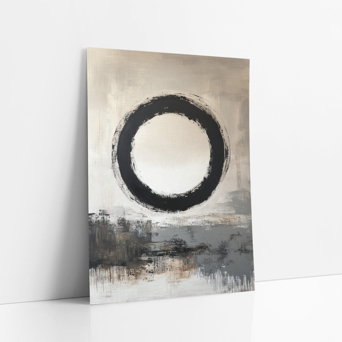 Floating Enso Taupe Horizon art print leaning against a white wall – large black enso brush circle with a cream center