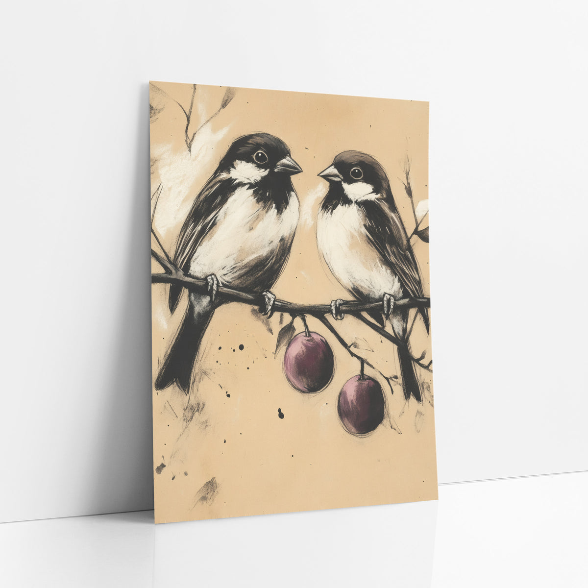 Charcoal Bird Pair Plum Branch art print leaning against a white wall – two small black and white birds perched on a bare