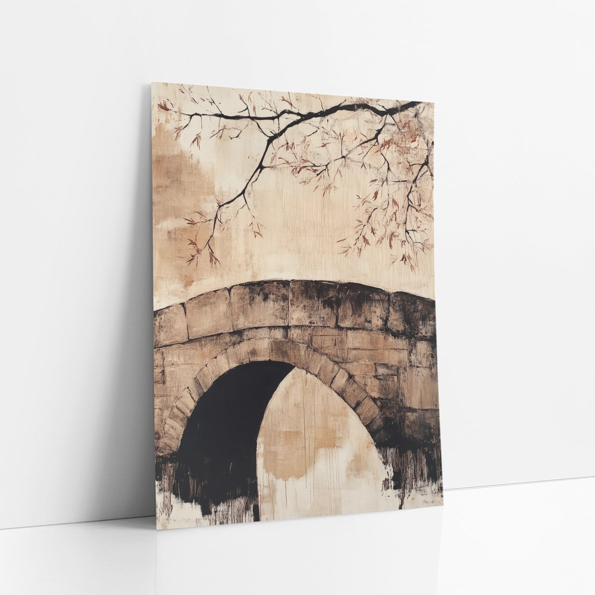 Old Stone Arch Bridge Japandi art print leaning against a white wall – stone arch bridge with a dark opening under a bare