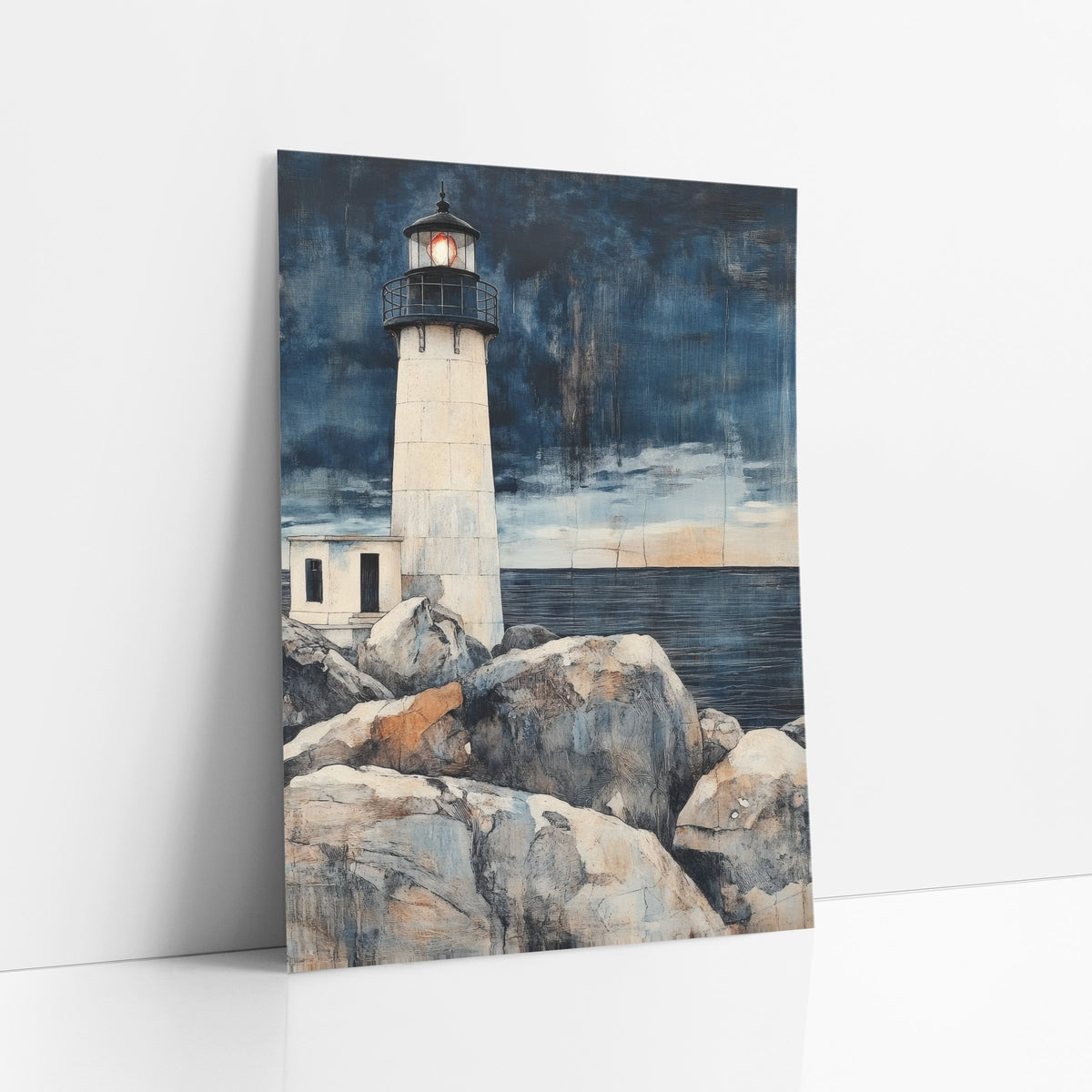 Indigo Lighthouse Coastal Japandi art print leaning against a white wall – cream lighthouse with glowing orange lamp on large