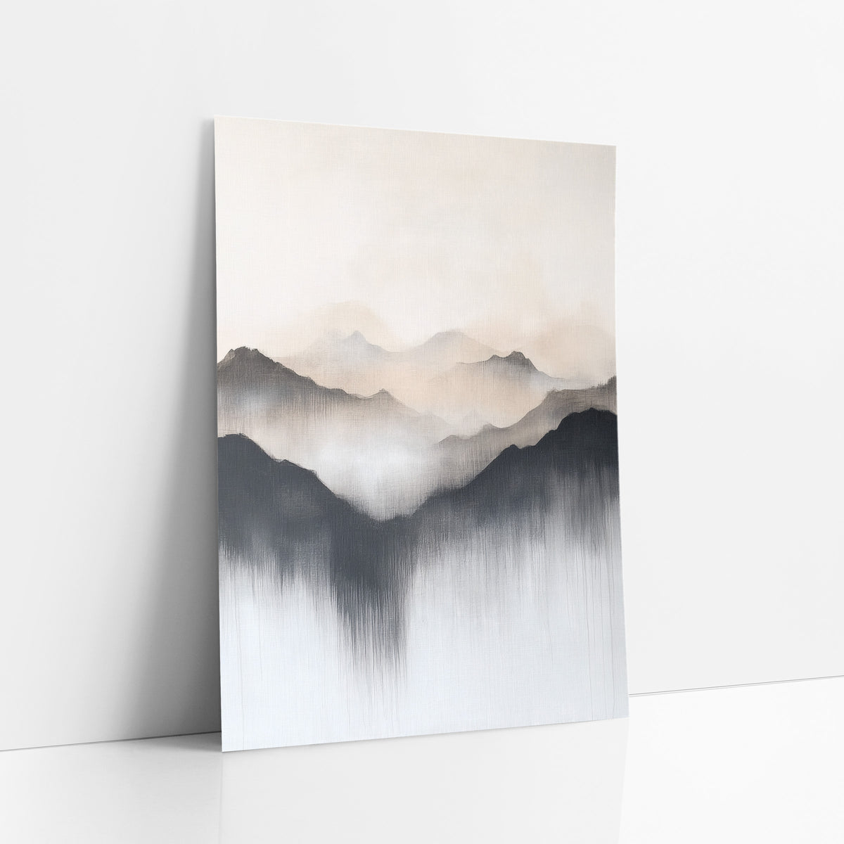 Misty Mountain Ridges Japandi art print leaning against a white wall – abstract mountain ridges in charcoal, beige and gray