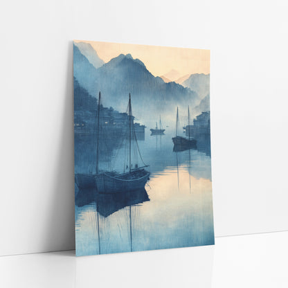 Twin Masts Village Harbor Woodblock art print leaning against a white wall – blue harbor scene with three wooden sailboats