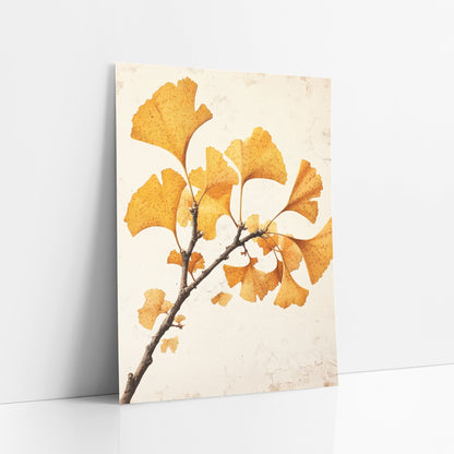 Ginkgo Speckled Leaf Sprig art print leaning against a white wall – ginkgo branch with golden yellow fan-shaped leaves