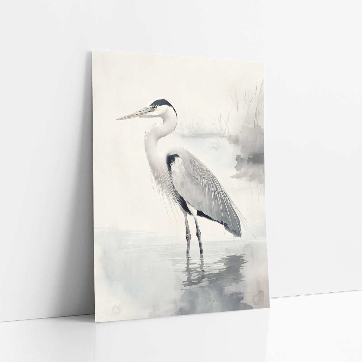 Gray Heron Misty Water Japandi art print leaning against a white wall – gray heron standing in shallow misty water with reeds