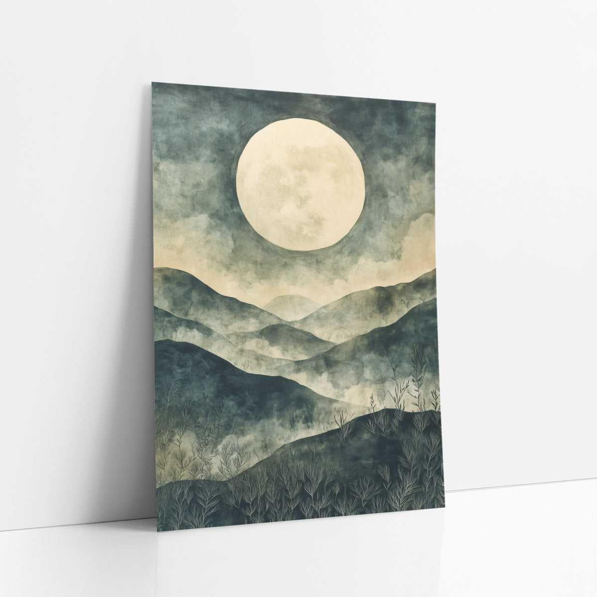 Pale Moon Misty Hills Japandi art print leaning against a white wall – large cream moon above layered teal and sage hills