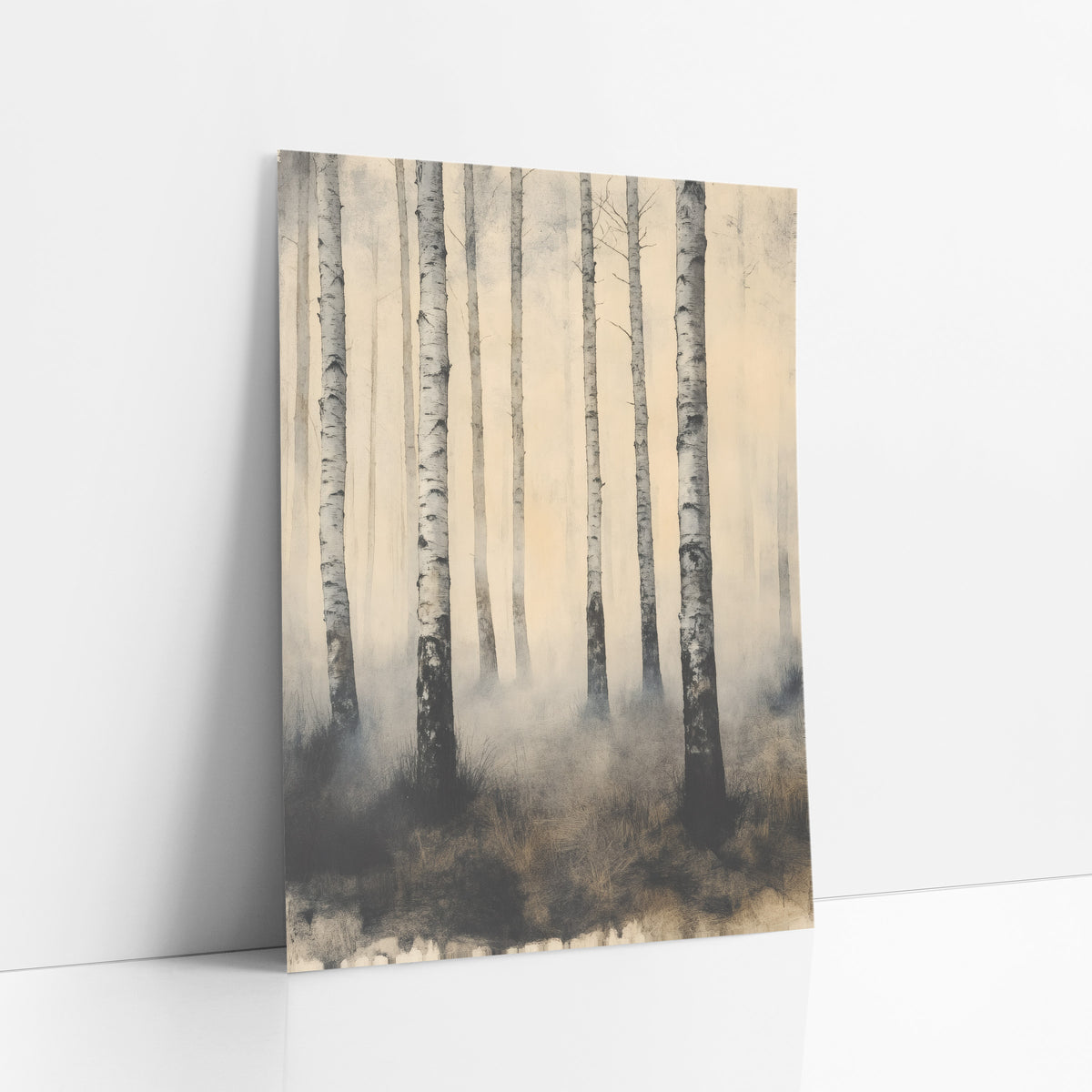 Misty Birch Trunks Japandi Landscape art print leaning against a white wall – tall white birch trunks in drifting gray mist
