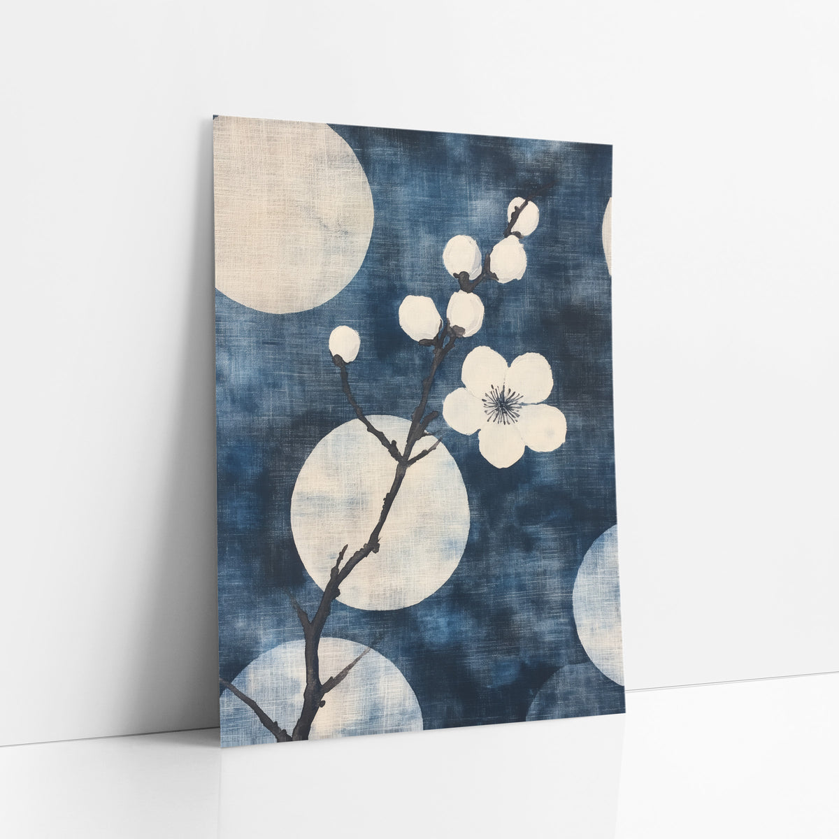 Indigo Plum Blossom Branch Japandi art print leaning against a white wall – white plum blossom branch with round buds