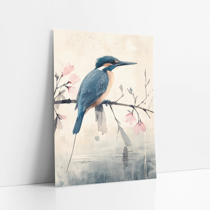 Kingfisher Magnolia Reflection Watercolor art print leaning against a white wall – blue and orange kingfisher on a bare