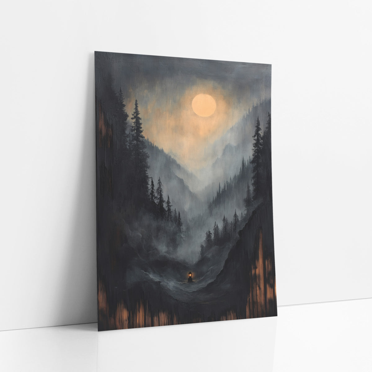 Lone Lantern Valley Floor Moon art print leaning against a white wall – misty mountain valley with dark evergreens, a pale