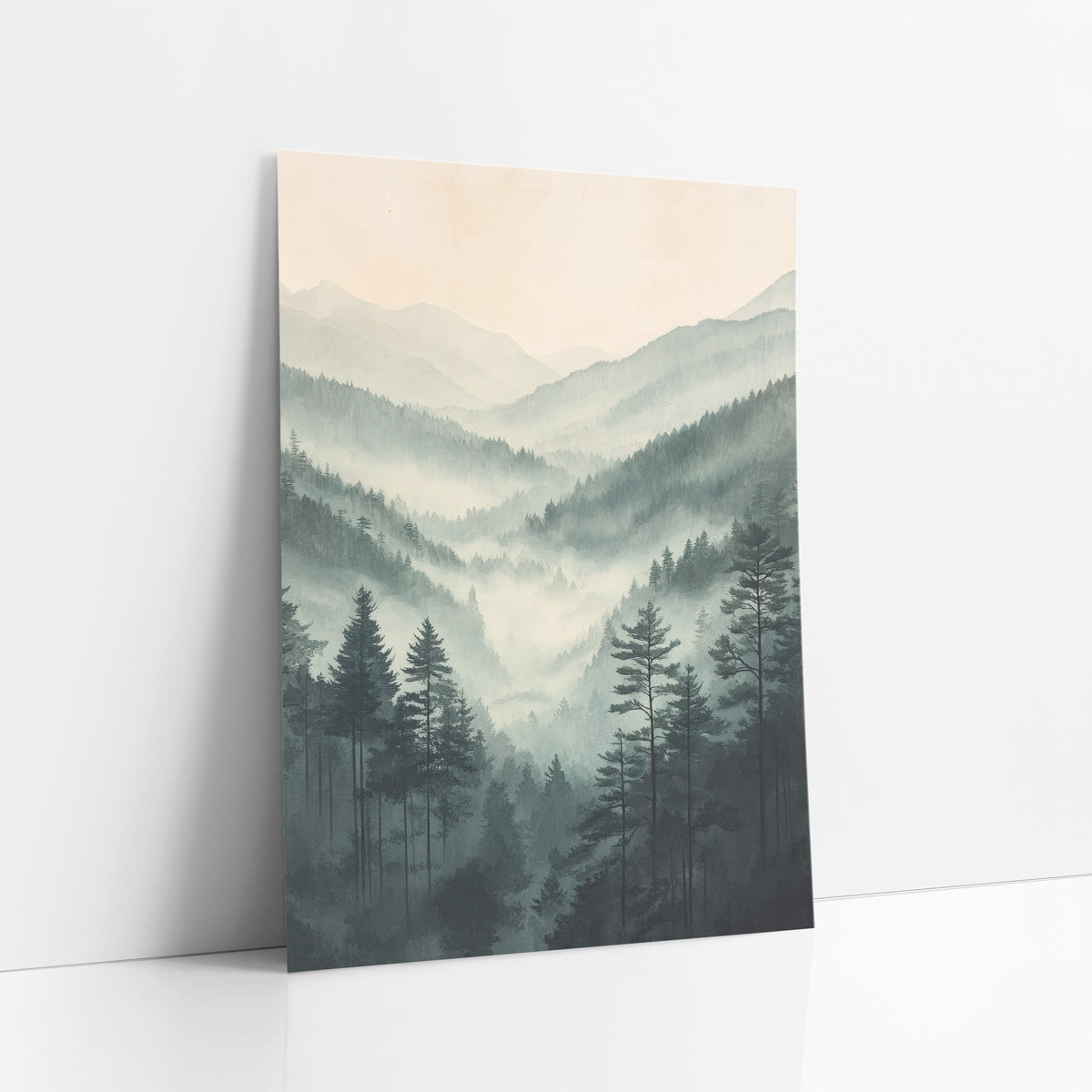 Towering Pines Overlook Fog Watercolor art print leaning against a white wall – misty valley of tall evergreens and layered
