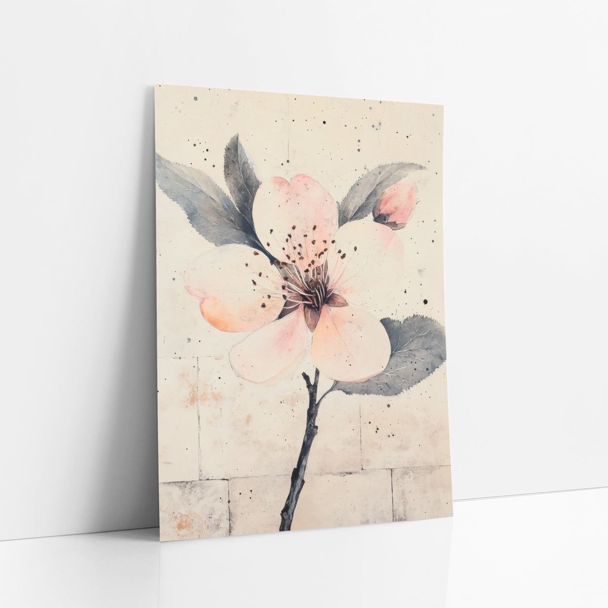 Peach Petal Bud Speckled Botanical art print leaning against a white wall – blush pink plum blossom with a bud and gray-green