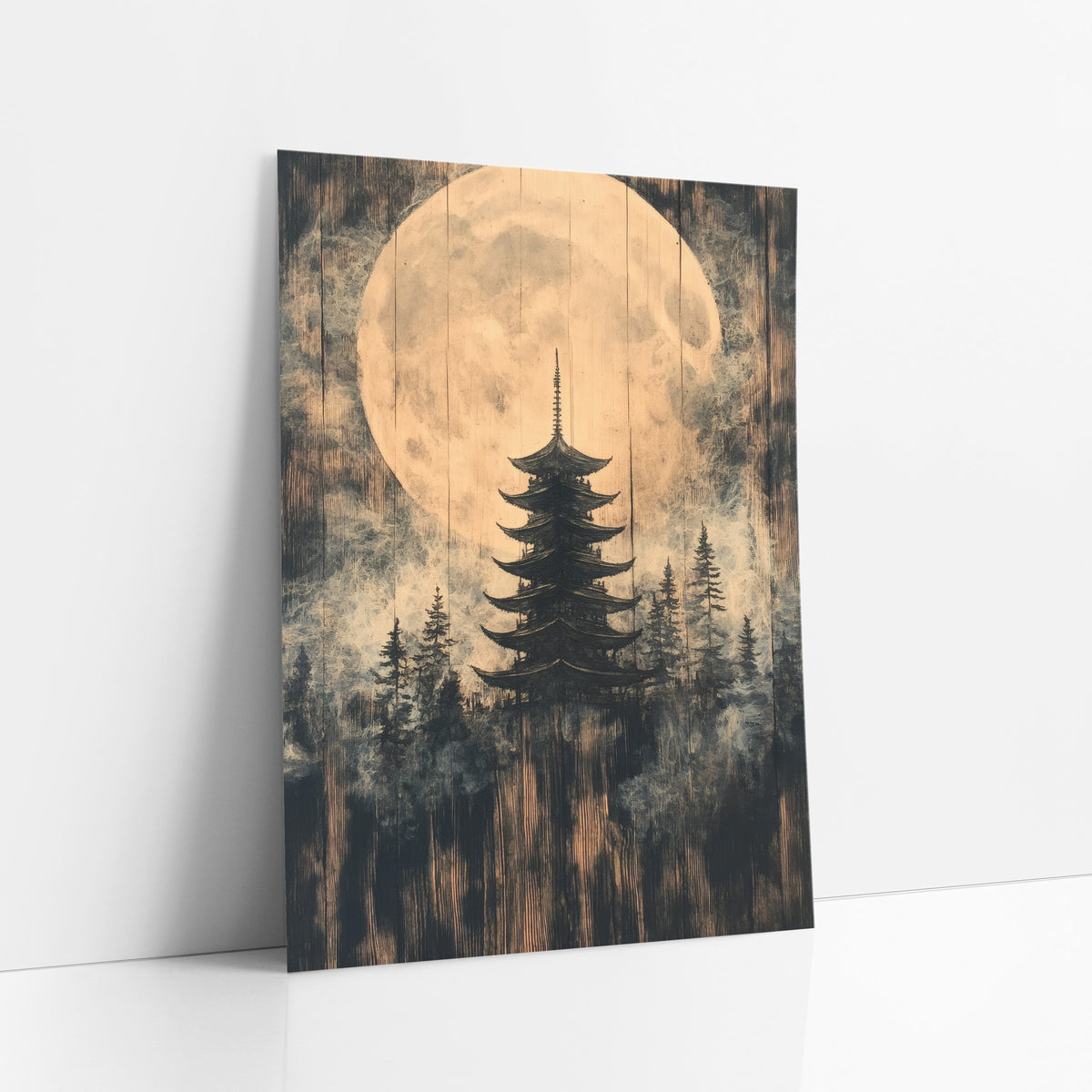 Giant Moon Pagoda Forest art print leaning against a white wall – five-tier pagoda among evergreens before a large pale full