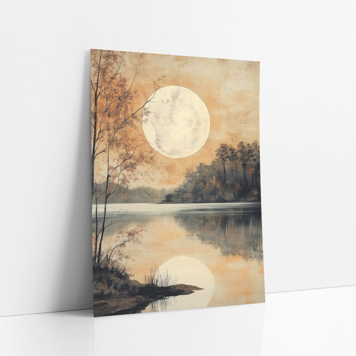 Autumn Birch Moonlit Shore art print leaning against a white wall – large pale moon over a still lake with its reflection