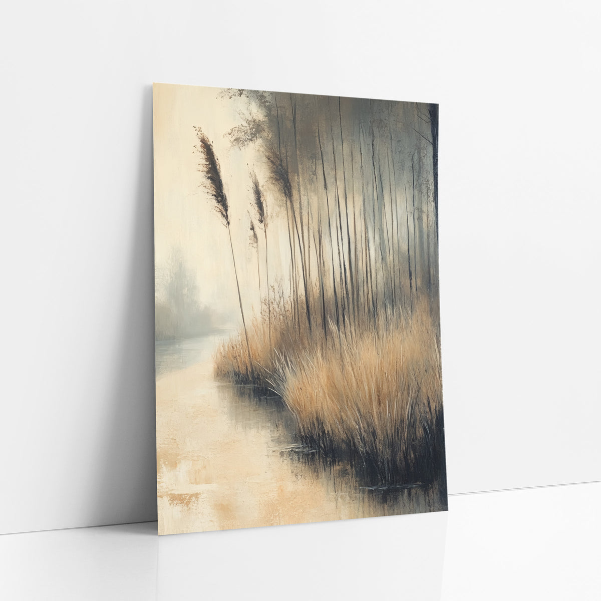 Golden Reed Channel Mist Landscape art print leaning against a white wall – golden reeds and slim dark trees beside a still