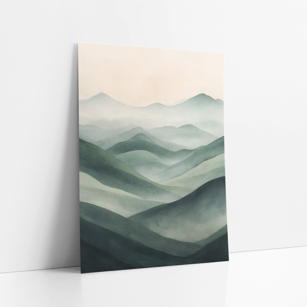 Sage Green Misty Hills Landscape art print leaning against a white wall – layered sage green hills fading into pale misty